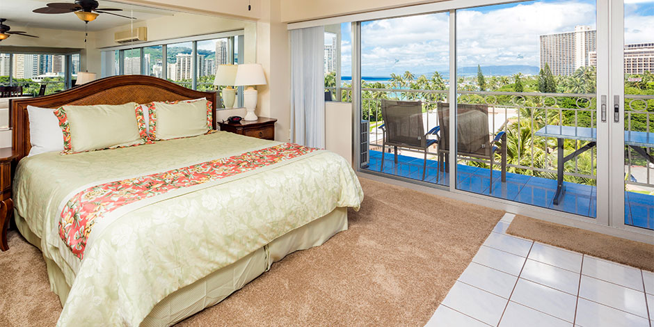 Bedroom at the 2 bedroom Deluxe Ocean View at Castle Waikiki Shore